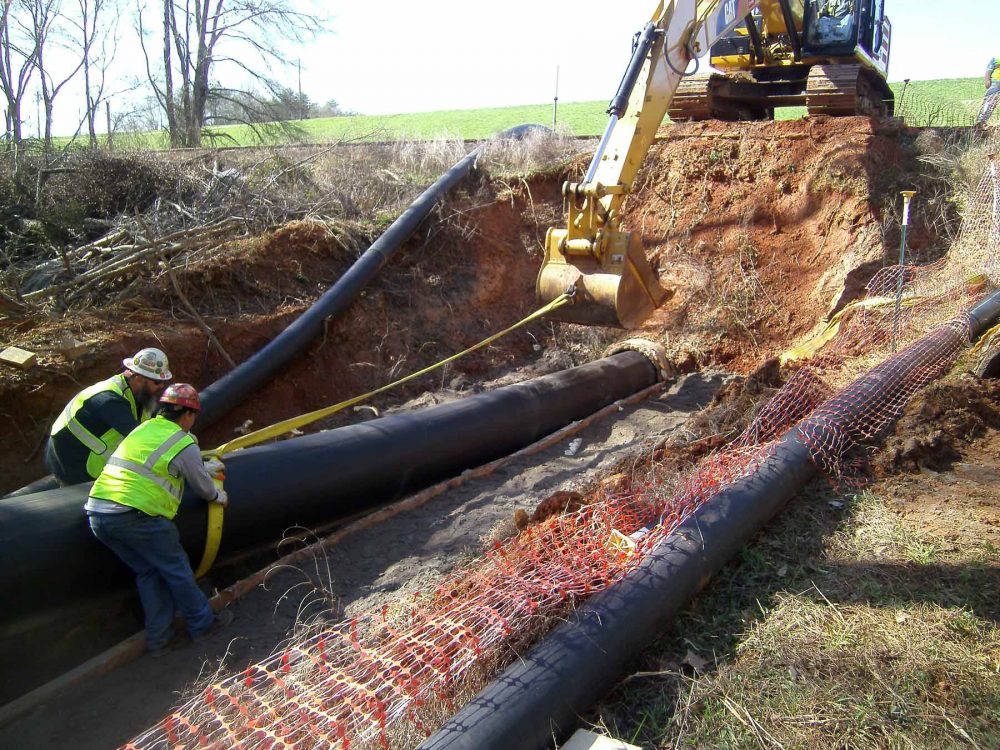 The HALL Contracting Corporation team working together on the Ash Outfall Slipline Project