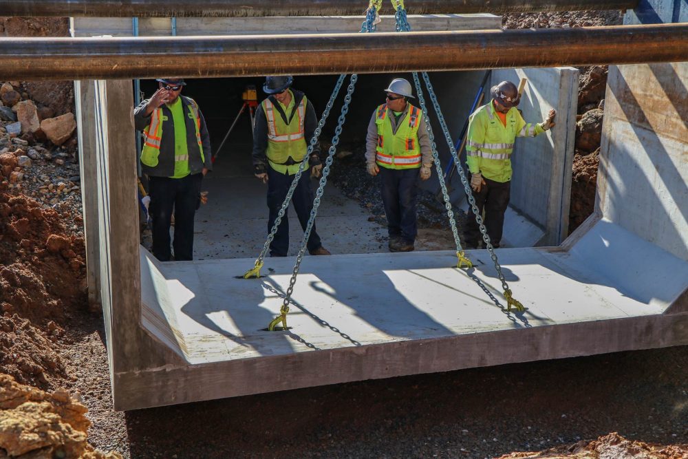 HALL employees working together on job site