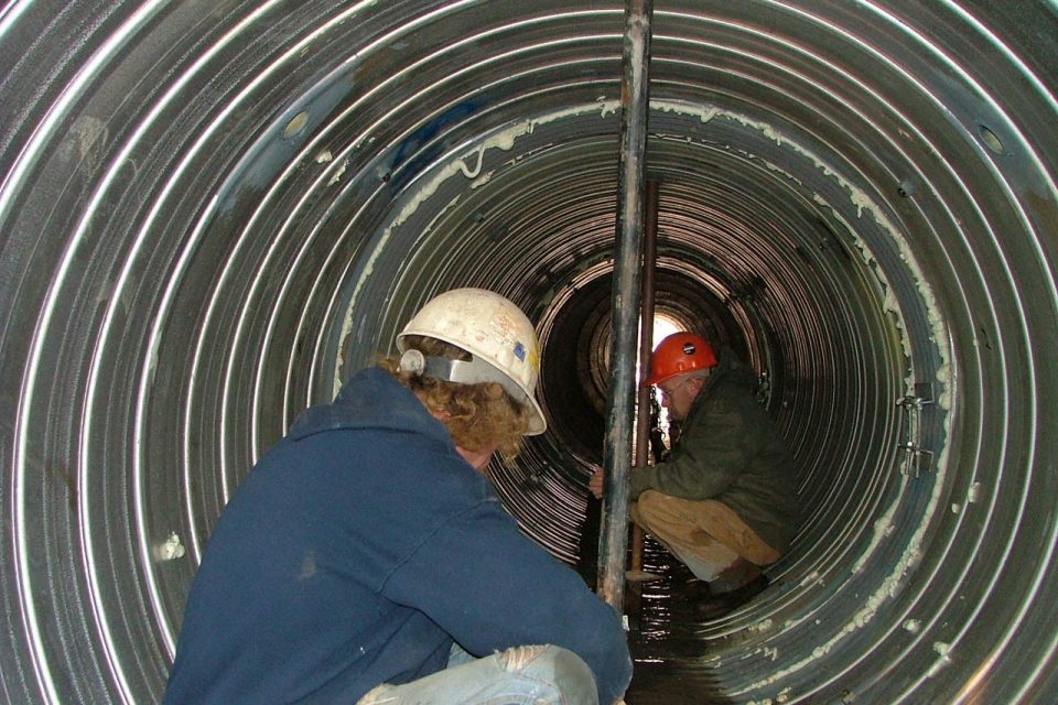 HALL employees putting in the utlra flo liner at the Concord Airport in NC