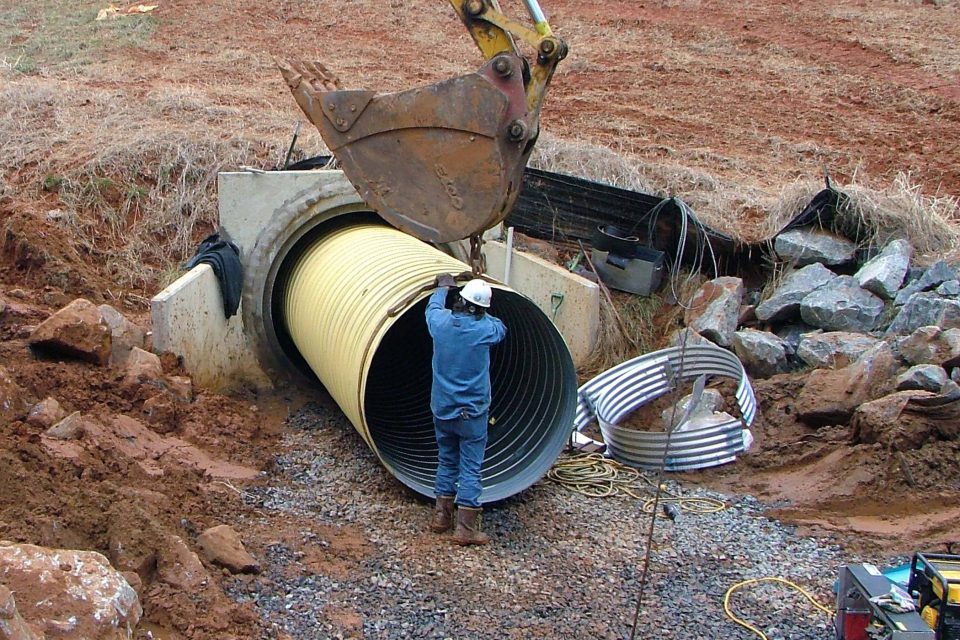 Pipe being inserted at the Concord Airport project