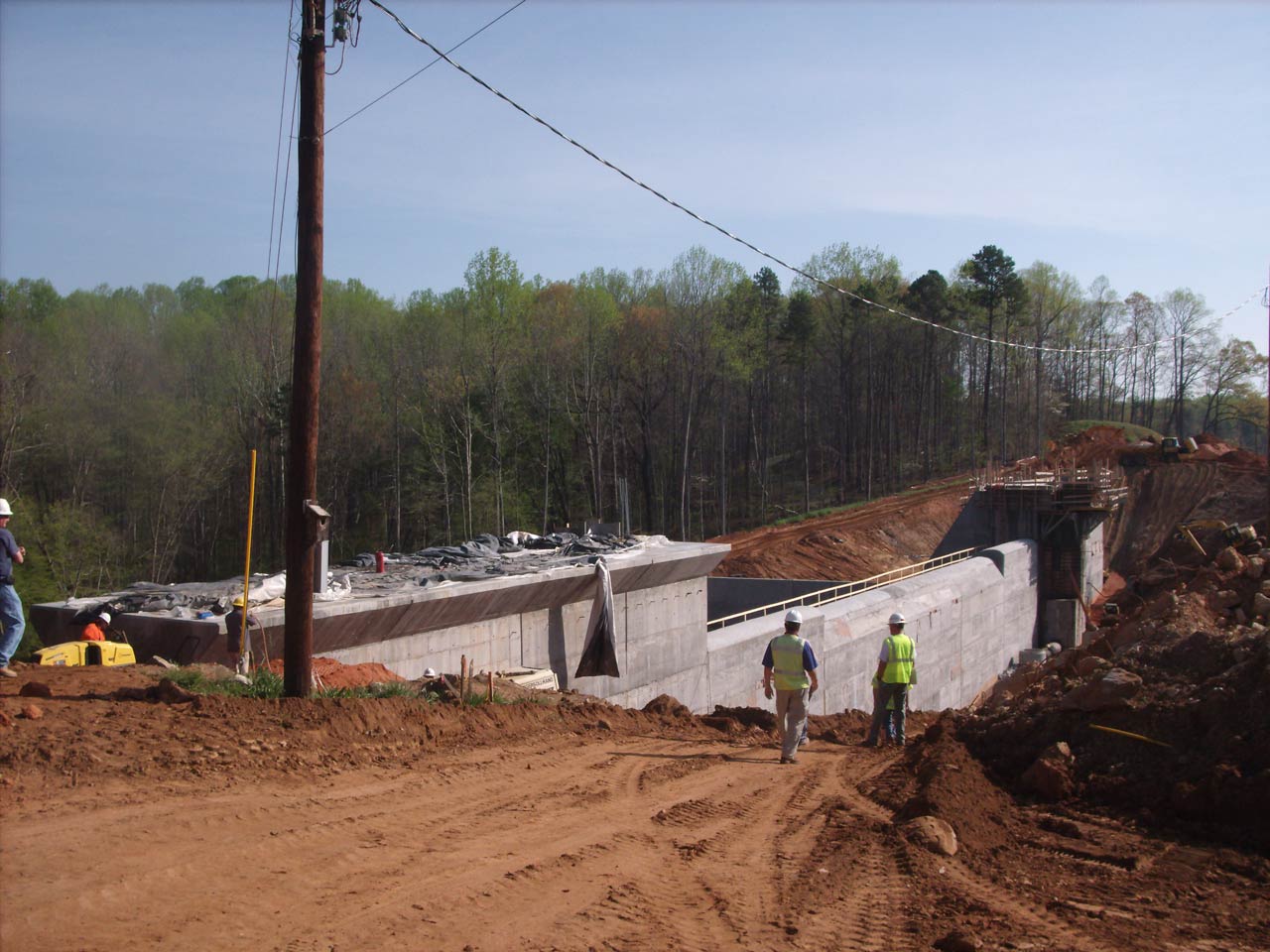 HALL employees working on the Salem Lake Dam